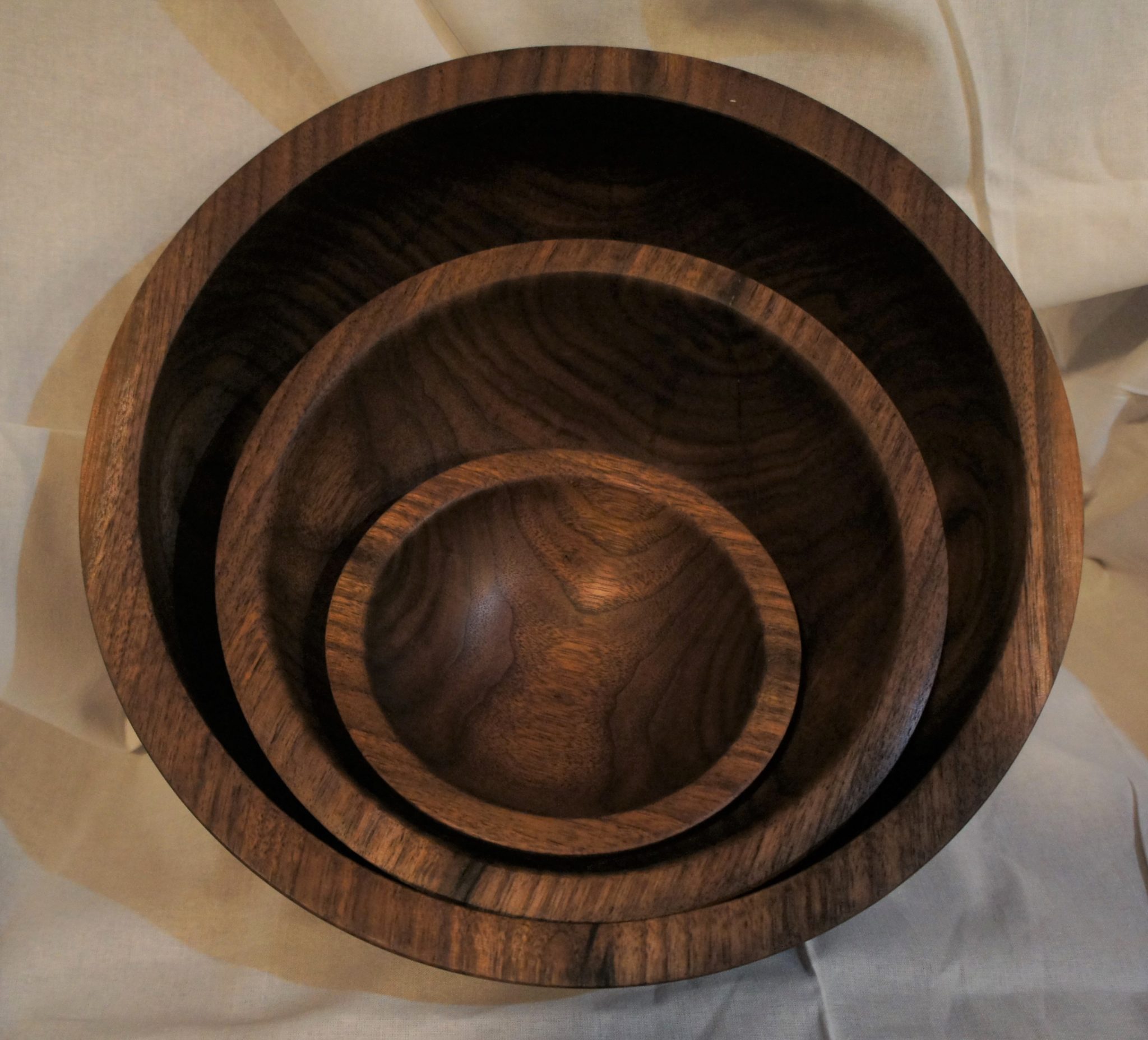 Set of three bowls cored from the same piece of walnut