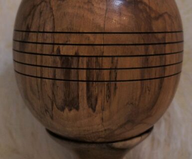 Pecan “dinosaur egg” on a mesquite base